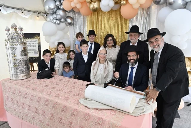 Only in America: A Joyous Tale of Two Sefer Torahs
