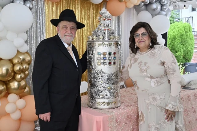 Only in America: A Joyous Tale of Two Sefer Torahs