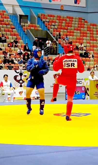 THE MAN BEHIND ISRAEL’S MEDAL-WINNING SAMBO SISTERS
