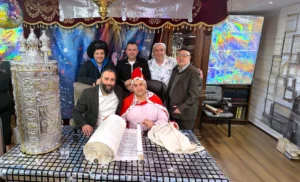 Purim Celebration Welcomes New Sefer Torah
