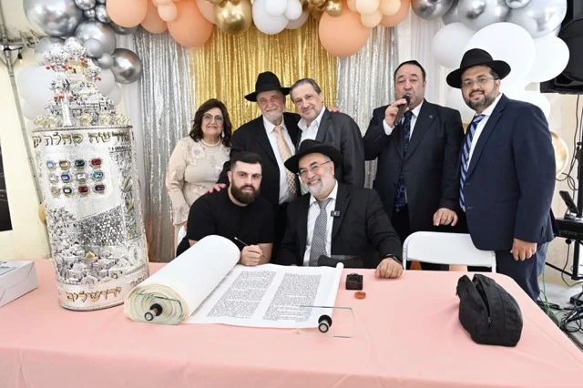 Only in America: A Joyous Tale of Two Sefer Torahs